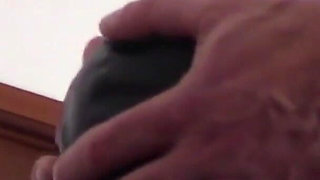 Laura hooded in a very close view of a great blowjob action with ring gag and huge cum swallow