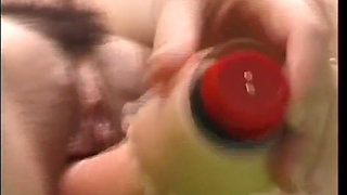 Intense Orgasm of a Young Girl with Dildo Inside Her Pussy