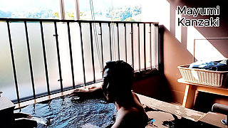 A Married Woman Taking a Bath in a Hotel Room