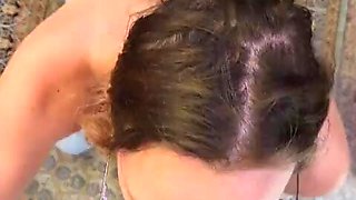 Nerdy cougar deep throats pink cigar on her knees