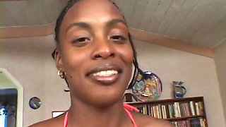 Horny ebony sits on a big white dick and fucks it hard with her pussy