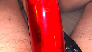 Athena plays with Nikos's cock while it's locked in chastity
