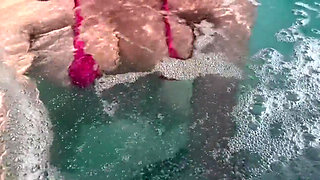 Artemisia Love Sexy and Horny Underwater Showing Her Big Tits in a Super Micro Bikini and You Can See Her Aureolas