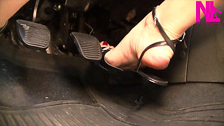 Driving in Buckled Open Toed Black Sandals and Thin Anklet