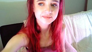 Amateur redhead poses and masturbates with toys