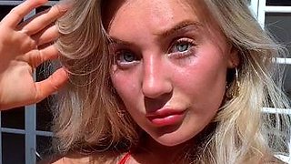 Blonde is flashing her big boobs in the outdoors