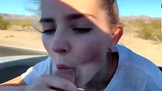Blonde young adult with enormous tits in a car