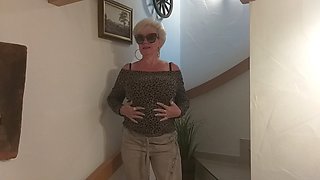 Horny Granny Masturbates on the Stairs