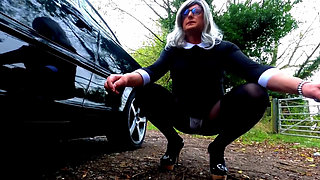 Amateur crossdresser Kellycd2022 in black dress and pantyhose outdoors