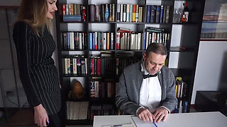 Femdom chick punishes her male slave in the office