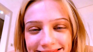 Blonde Looks Back While She Spreads and Toys Herself